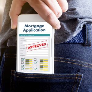 Phone displaying that a mortgage application has been approved.